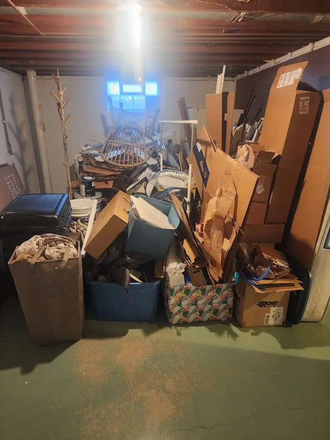 Roll-off dumpster container at job site for 2 Yard Dumpster Rental in Reedsport